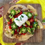 You won't miss the meat in these vegetarian nachos featuring diced, sauteed mushrooms! Recipe at Teaspoonofspice.com