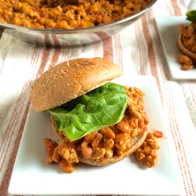 Low sodium tomato soup, pinto beans and diced veggies adds a nutrition boost to a family favorite meal: Sloppy Joes.