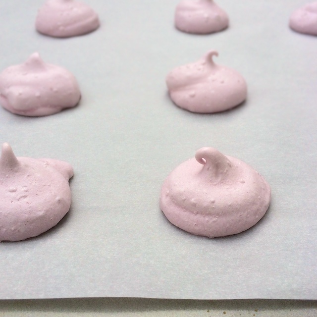 Easy to make meringue cookies dyed pink naturally with blood orange juice.  Recipe at Teaspoonofspice.com #valentines #dessert #recipe #meringue #cookies #fooddye