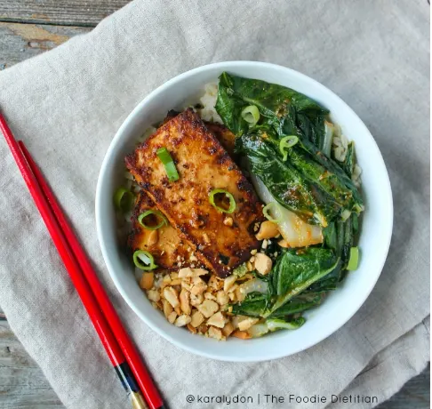 27 Delicious Ways To Enjoy Leafy Greens -like this Spicy Peanut Tofu and Bok Choy Bowl