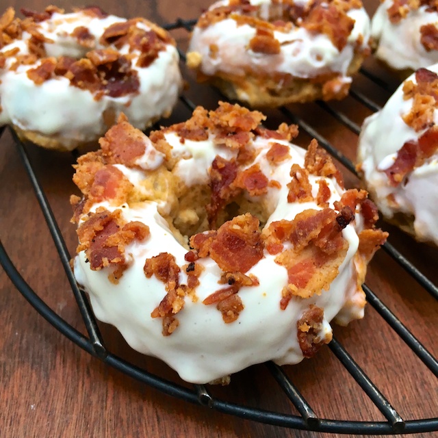 Celebrate St. Patty's Day with these baked donuts covered with whiskey bacon frosting made with Greek yogurt! @tspbasil @healthyaperture