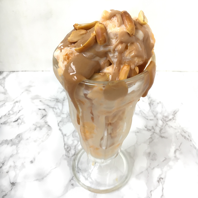 A fall veggie twist on the classic sundae: sweet potato puree mixed into vanilla ice cream and topped with low sugar peanut butter sauce!