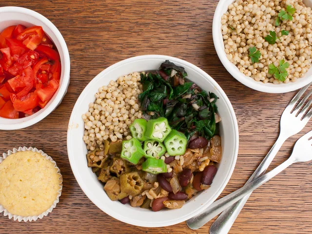 Power your meal with veggies and comfort food like Red Beans & Rice and Garlicy Greens: SOUL FOOD POWER BOWL - VEGETARIAN | @TspCurry For more protein-powered recipes go to TeaspoonOfSpice.com