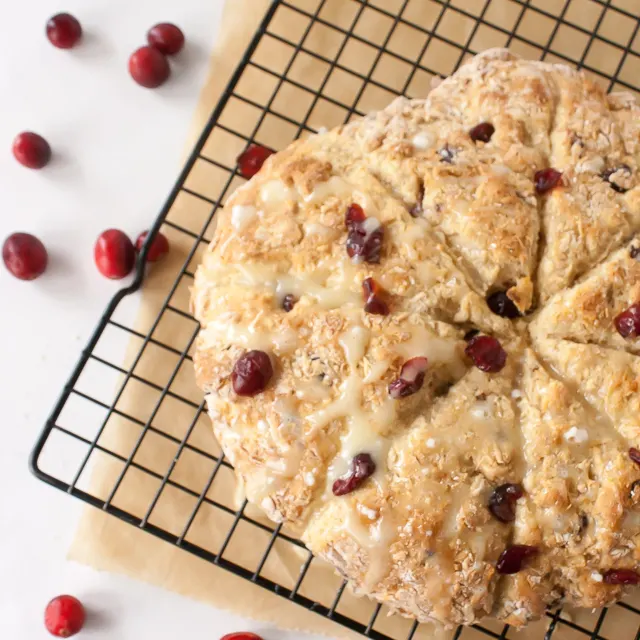 Easy to whip up for last minute guests - or just because they are soooo good: 5 INGREDIENT EGGNOG CRANBERRY SCONES | @TspCurry - For more holiday recipes: TeaspoonOfSpice.com