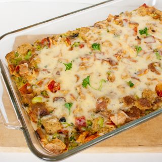 Easy and Cheesy Pizza Bread Pudding: A yummy way to use up leftover pizza. Dinner or brunch recipe that can be on the table in under an hour! | @TspCurry >> TeaspoonOfSpice.com