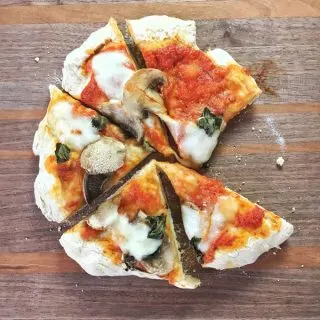 The easiest homemade pizza dough ever - only 3 ingredients and no rising time needed! Recipe and more Healthy Kitchen Hacks at Teaspoonofspice.com