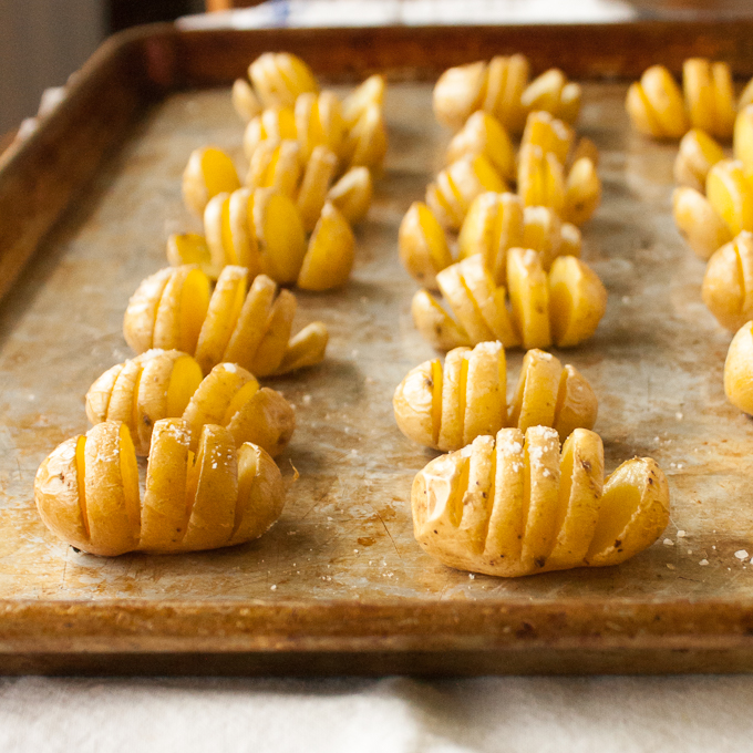 Warm, crispy-skinned, salty snacks topped with cottage cheese. These Protein Packed Mini Potato Fans take only 4 minutes to slice into healthy hasselback's! | @TspCurry For more healthy recipes: TeaspoonOfSpice.com