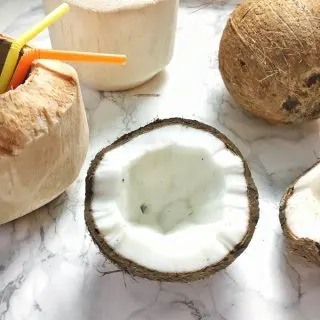 Here are the best ways to open young and mature coconuts - without any fancy tools! Healthy Kitchen Hacks at Teaspoonofspice.com