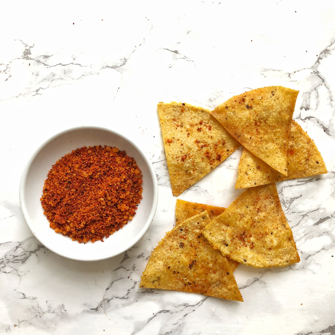 You can make tortilla snack chips at home in your oven or microwave. Check out our hacks for salted, ranch and nacho cheese flavors! Recipes at Teaspoonofspice.com