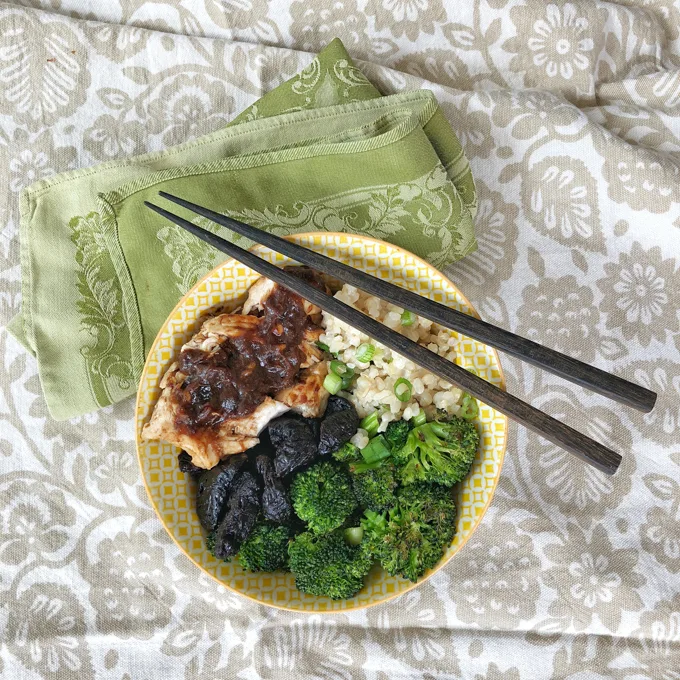 California prunes are the star ingredient in a sweet and savory sauce for this Asian-style chicken, broccoli and rice bowl.